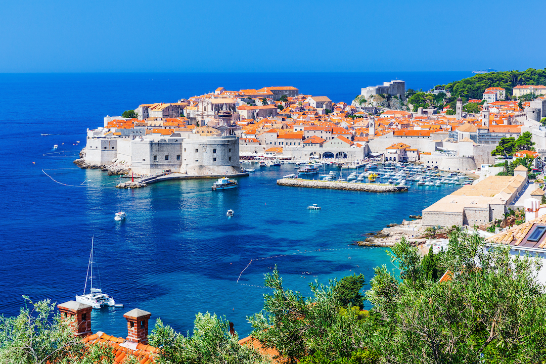 Dubrovnik in Croatia with rust-coloured roofs and walled city